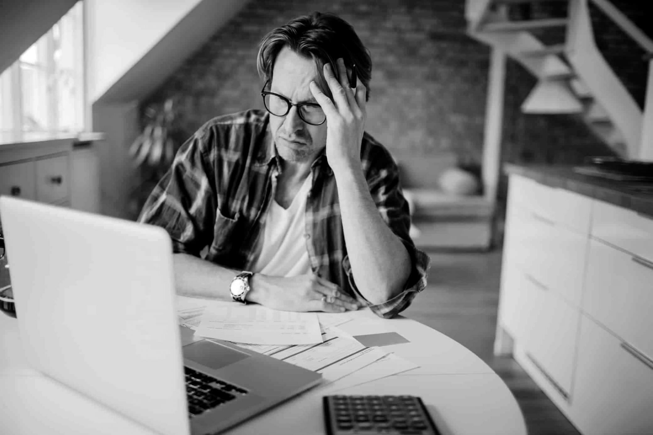 Reporter reviewing notes and documents during story development process