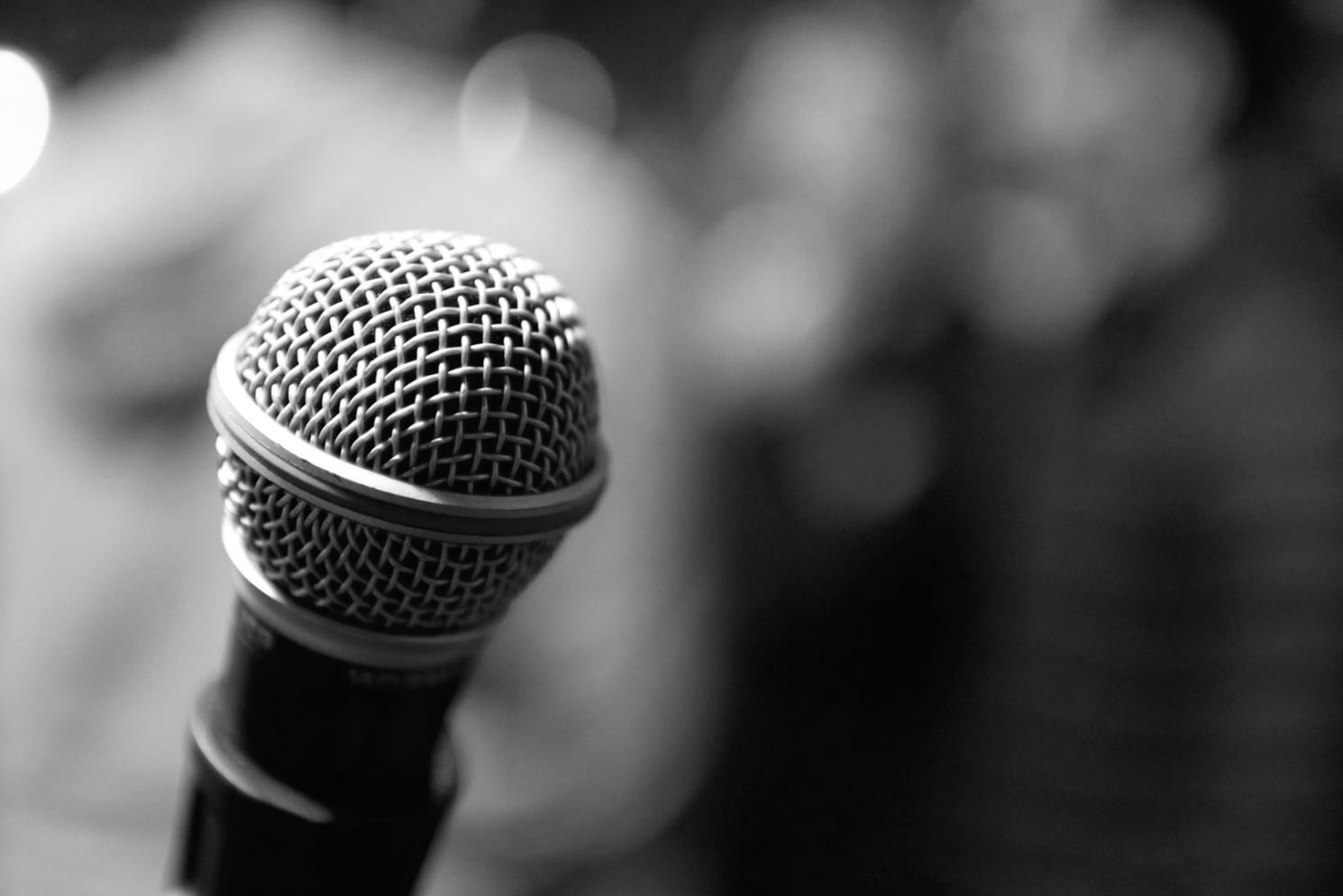 Professional news reporting environment with journalists collaborating on breaking stories